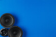 © Oleksii Halutva - Car audio system on a blue background. Copy space