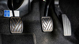 Fototapeta Tęcza - Brake and gas pedal on the car