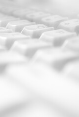 close-up of computer keyboard over white background