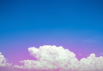 Wall Mural - sky and clouds nature background,pink and purple light in blue sky with soft clouds