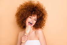 Close-up Portrait Of Her She Nice Cute Charming Attractive Cheerful Positive Funky Childish Wavy-haired Girl Singing Comb Shower Bath Preparation Isolated Over Beige Pastel Background