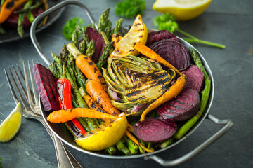 Healthy roasted vegetables in the cooking pan