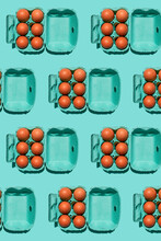 Pattern Of Chicken Eggs In Turquoise Colored Cartons