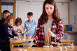 © Westend61 - Girl setting up construction during a science lesson