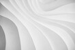 © Per Swantesson/Stocksy - Wave pattern paper sculpture background