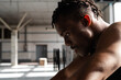 © Milles Studio/Stocksy - Sweaty black athlete in gym