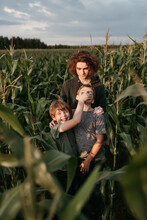 Young Brothers In A Corn Green Field