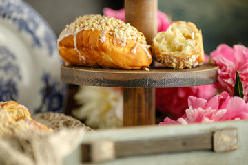 Wall Mural - breakfast pastries served with flowers, retro style