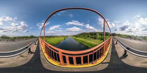Wall Mural - full seamless spherical hdri panorama 360 degrees  angle view on concrete bridge near asphalt road across river in sunny summer day in equirectangular projection, AR VR virtual reality content
