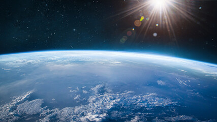 Aufkleber - Planet earth in dark space. Sun light and stars on background. Space wallpaper. Elements of this image furnished by NASA