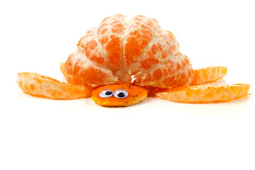 Wall Mural - Food art creative concepts. Turtle made of mandarin orange and skin. Funny dessert for children. Fruit isolated on a white background.