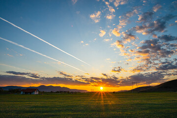 Wall Mural - Clouds at the sunset