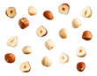 Full and halfs of hazelnuts on white background.