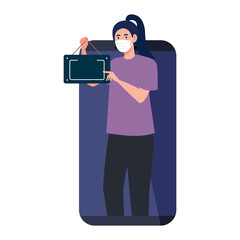 Wall Mural - shopping online on website or mobile, woman wearing medical mask against covid 19 with sign hanging 