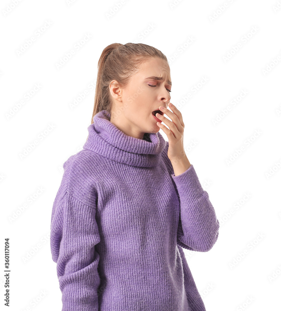 Young woman suffering from sleep deprivation on white background