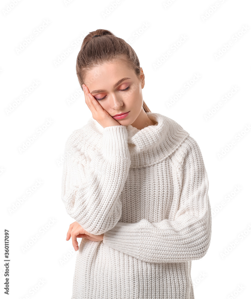 Young woman suffering from sleep deprivation on white background
