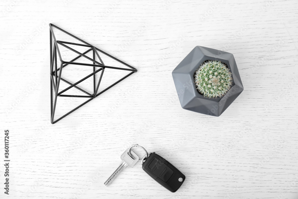 Key from car on white table