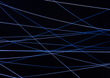 Image Of White Threads Tangled In Ultraviolet Light