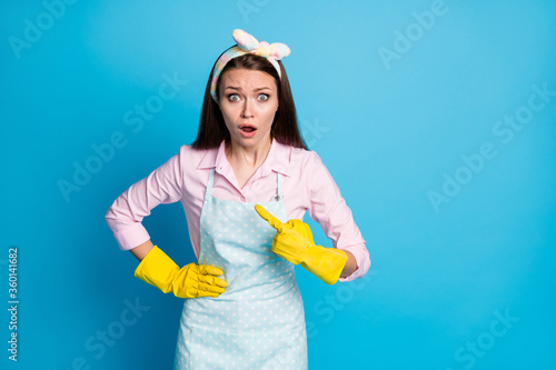 Portrait of her she nice attractive lovely worried girl washer maid pointing at herself guilty dirty dusty floor home isolated over bright vivid shine vibrant blue color background
