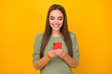 Sticker - Portrait of positive cheerful girl use smartphone read social media news share repost subscribe wear good look pullover isolated over bright color background