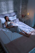 © Impact Photography - Pregnant woman sleeping in bedroom