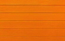 Wooden Boards Painted In Orange. Orange Wood Background.