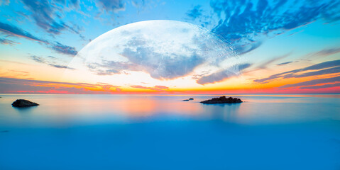 Wall Mural - Long exposure of sunset at Alanya Beach, Alanya, Antalya - Long exposure image of Dramatic sky and seascape with rock and full moon 