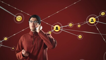 Sticker - Animation of mixed race man smiling and talking on his smartphone with network connections of people