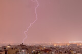 Fototapeta Tęcza - Lightning storm strikes the city of Thessaloniki, Greece