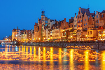 Wall Mural - Fire show on Motlawa River during Fair St. Dominic in Gdansk at night, Poland