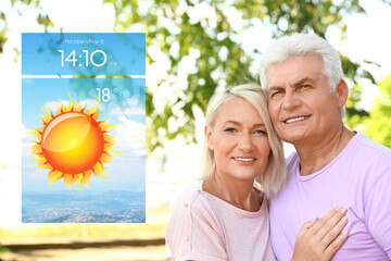 Wall Mural - senior couple on city street and weather forecast widget. mobile application