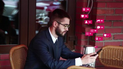 Man Using a Tablet Computer in a Summer Cafe