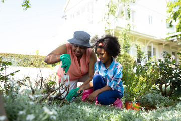 Wall Mural - Family gardening together