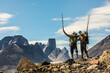© Cavan Images - Portrait of two backpackers on mountain ridge in Akshayak Pass,