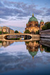 The Berlin Cathedral after sunset with a reflection in the river Spree