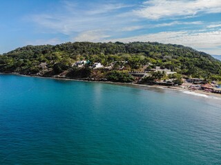 Canvas Print - Aerial shot of a beautiful coastline with lots of houses