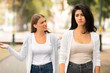 © Prostock-studio - Two Girls Friends Having Quarrel Walking In Park Outdoors