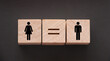 Concepts of gender equality. wooden cubes with female and male symbol and equal sign. Equal pay social quaranty concept