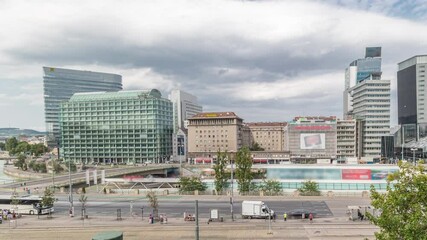 Wall Mural - The Schwedenplatz aerial timelapse (Sweden Square) is a square in central Vienna, located at the Danube Canal and one of the most important public transport junction. Old and modern buildings around