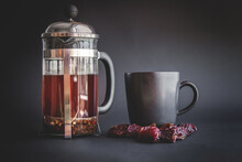 Brewed Masala Herbal Tea In A French Press. Red Berries And Flowers, Anise At The Bottom. Healthy Eating And Slimming Concept
