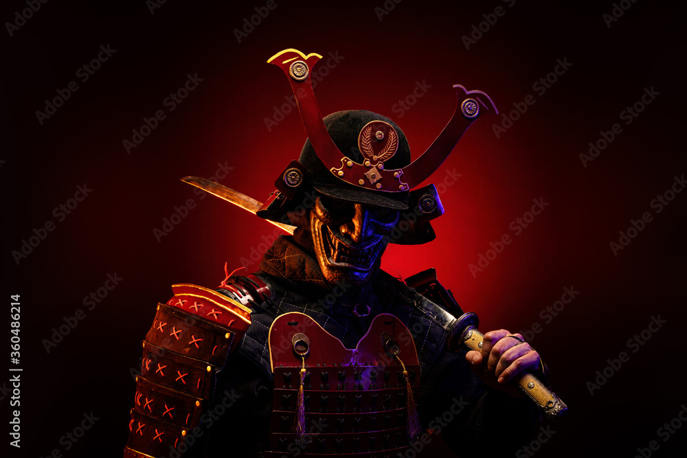 Portrait of a samurai in red armor in profile, his katana on his shoulder - obrazy, fototapety, plakaty 