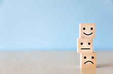 Wooden Blocks With The Smiling Face On The Table