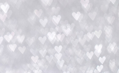background with heart shape snow bokeh out of focus 