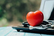 red heart  and stethoscope on the laptop