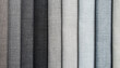 Close up multi color fabric texture samples in grey tone. detail of linen fabric samples. interior material background.