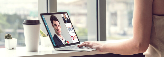 Video call business people meeting on virtual workplace or remote office. Telework conference call using smart video technology to communicate colleague in professional corporate business.