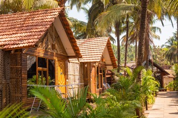 Sticker - Beautiful eco-cottages made from bamboo and coconut leaves captured in Goa, India