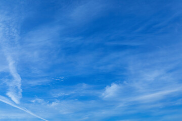 Wall Mural - Blue sky with some white clouds around