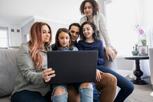 Family On Video Call On Computer