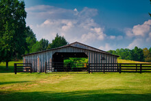 Horse Barn With A Beautiful Blue Sky